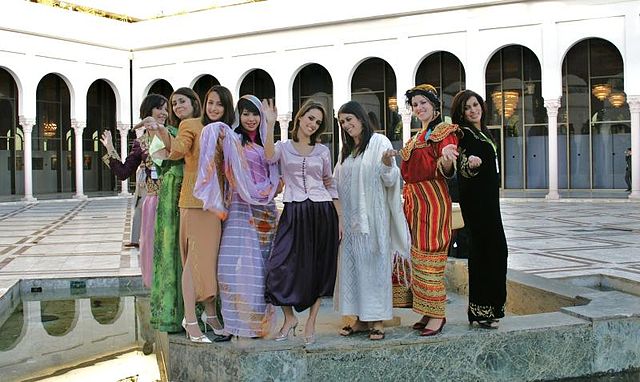 Women in traditional attire (Yves Jalabert/Wikipedia Commons)
