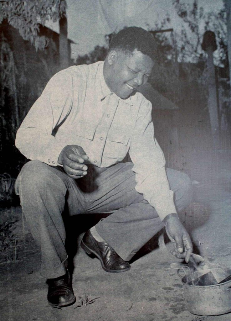 Mandela burning his mandatory identification document, 1960 en.wikipedia.org