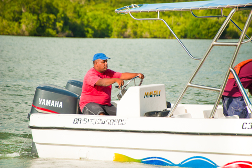 Boat captain in Caribbean (Shutterstock)