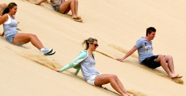 sandboarding stockton dunes in australia