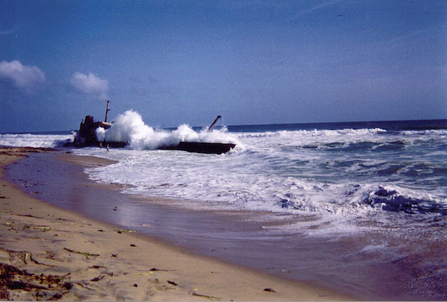 surfing at shipwreck in angola