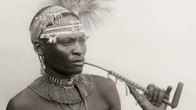 Xhosa man with pipe, South Africa, 1920s. Photo: Alfred Martin Duggan-Cronin